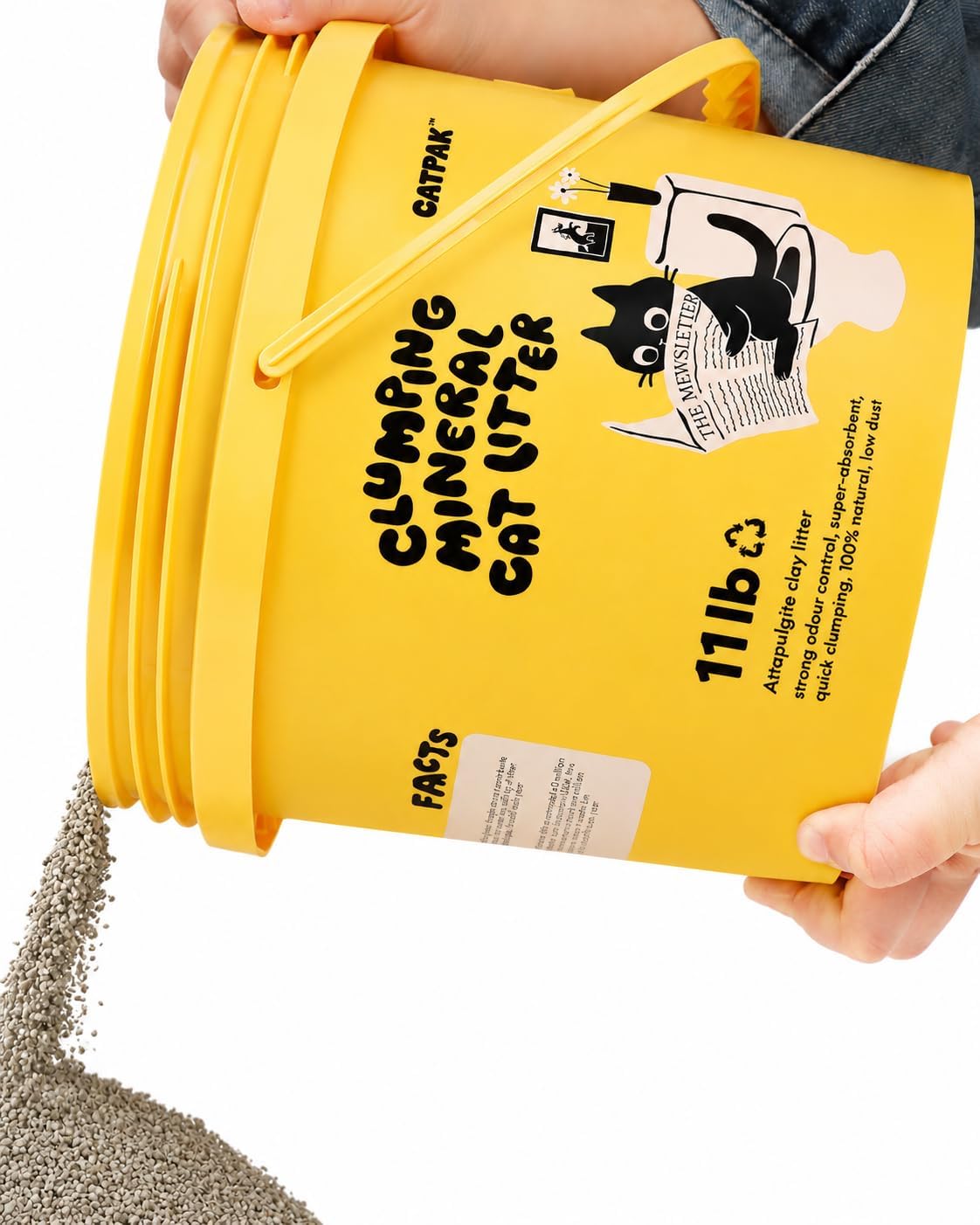 CATPAK 5kg cat litter tub held by the handle